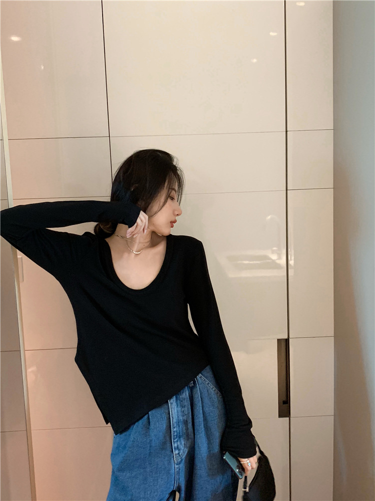 帮手描述图：不规则白色修身长袖T恤女2021春秋新款设计感紧